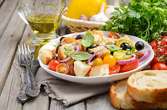 Traditional Italian Panzanella salad with fresh tomatoes and crispy bread