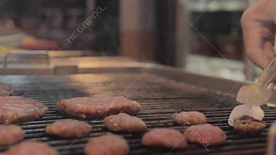 Cooking meatball on grill