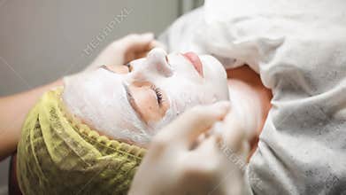 Girl visits cosmetology clinic. Aesthetic medicine.