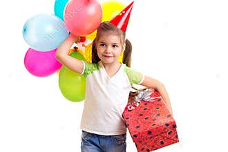 Little happy girl celebrating birthday with ballons and red box with gift