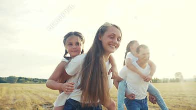 Dream holiday concept. happy family fun walks in the park with kid. parent father and mother carry children with sister