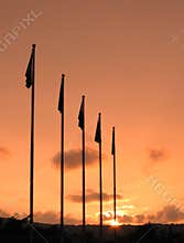 Flagpoles and Sunset