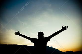 Silhouette of Outstretched Arms