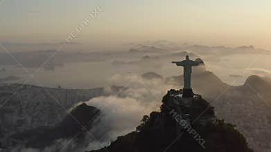 Drone, panoramic view of Chris the Redeemer during sunrise over Rio de Janeiro