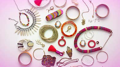 Woman`s jewelry flat lay composition. Necklaces, earrings, rings and bracelets