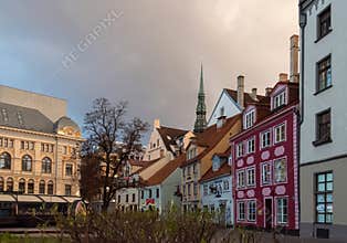 Empty Līvu Square in the Old Town of Riga with beautiful clouds in the sky over it
