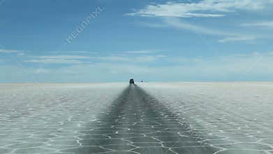 Driving on salt flats in Bolivia