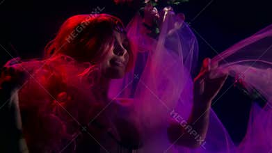 Romantic underwater shot of young pretty woman, magical and mystical theme