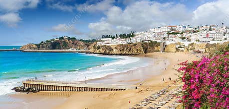 Landscape with old town Albufeira and sandy city beaches