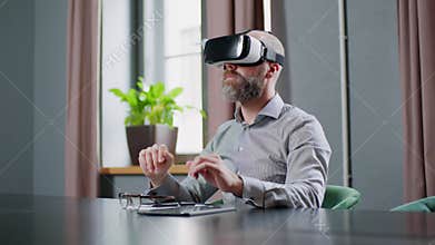 Company Worker Gesturing in Virtual Reality Glasses .