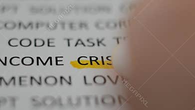 Macro shot highlighting the word `CRISIS` with a yellow marker