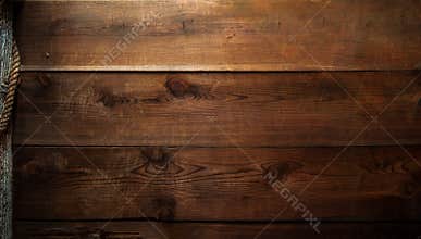 Old pine wooden barn wall closeup background rope accent