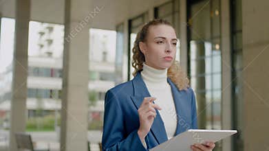 Beautiful Businesswoman Walk With Tablet .