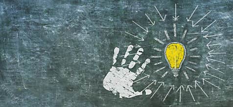 Idea, innovation, solutuion concept weth light bulb and human hand on black board, design template, copy space