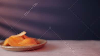 Drinking Beer at Home. Person Relaxing by Cold Alcohol Drinks and Potato Chip Snack at Night. Static shot