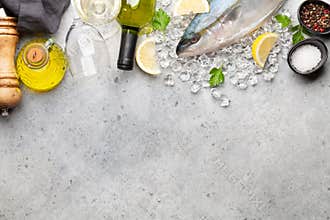 Raw fish cooking. Seafood and wine