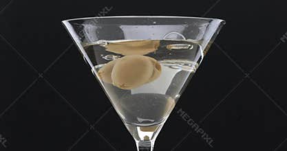 Martini Cocktail Poured And Olives Added