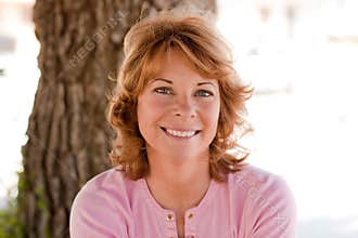 Portrait of pretty middle-aged woman