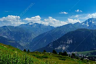Green high altitude Alps pasture