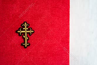 Orthodox cross on a red and white background