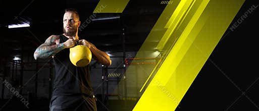 The male athlete training hard in the gym. Fitness and healthy lifestyle concept. Flyer.