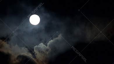 Full Moon Rises in Clouds on Sky in Night, Mystical Moonlight in Evening, Timelapse, View Moon Light in Cloudy Time Lapse