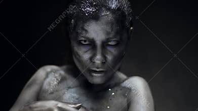 Close up of model with professional horror makeup .