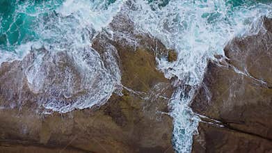 Top view of the desert stony coast on the Atlantic Ocean. Coast of the island of Tenerife. Aerial drone footage of sea