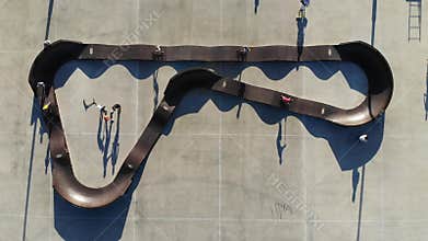 All wheels, all ages on modular pumptrack: Riding bikes, scooters and skateboards