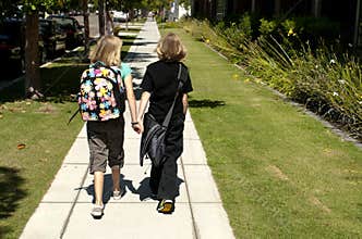 Two Kids Walking to School