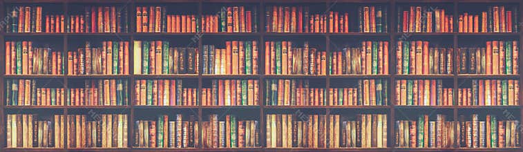 Panorama blurred bookshelf Many old books in a book shop or library