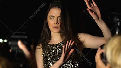 Annoyed actress refusing to take photo, feeling tired of annoying photographers