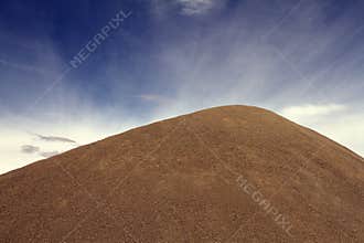 A majestic pile of dirt, gravel, and sand