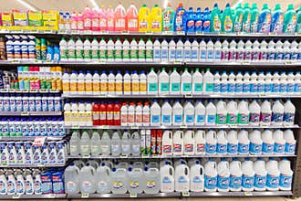 Household cleaning detergents, ammonia, bleach, alcohol. Full shelves in new store.
