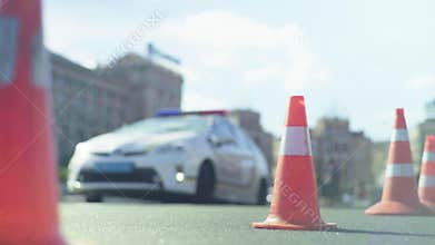 Police cone on the road. Place of accident. Transport. Road traffic. Sign. Kyiv.
