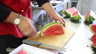 Time Lapse - The cook cuts a watermelon