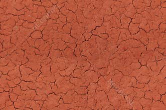 Cracked red textured surface seamlessly tileable
