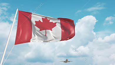Airliner approaches the Canadian flag. Tourism in Canada