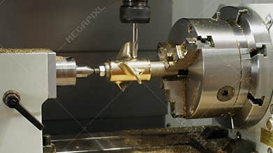 Automated and robotic drilling and milling machine at an industrial plant.