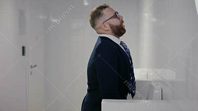 Man running to toilet bowl and peeing.