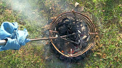 Branding iron is heated to seal cattle