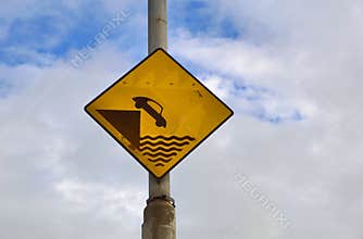 Traffic sign: Car crashes into the water