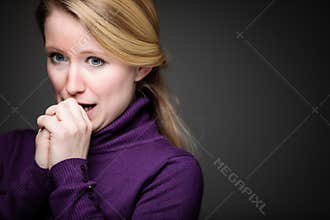 Fear/anxiety/regret/uncertainty in a young woman