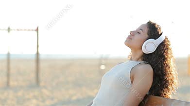 Woman listening and feeling music in slow motion