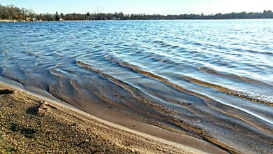 Gentle, Rhythmic, Waves Rolling Onto Shore