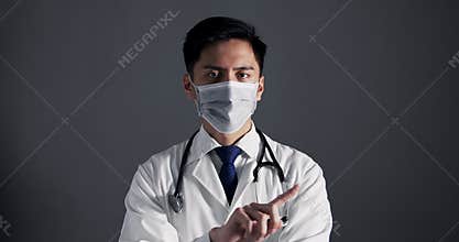 Young Doctor saying No with Finger