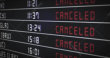 Flight information board with canceled flights. Arrival and departure times on information board are changed to canceled.