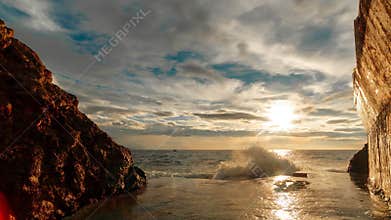 Time lapse. Sunrise on the coast of the sea.