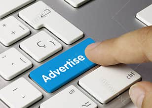 Advertise - Inscription on Blue Keyboard Key