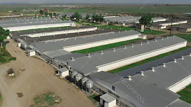 Agricultural firm aerial view. A modern enterprise for the production of various livestock products. New workshops and